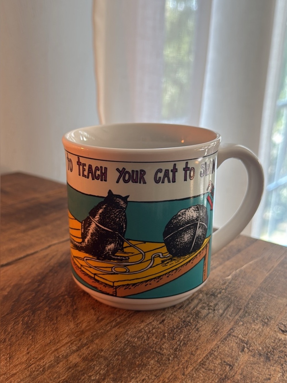 Vintage Ceramic Cat-Themed Coffee Mug in Teal and Yellow made by Recycled Paper